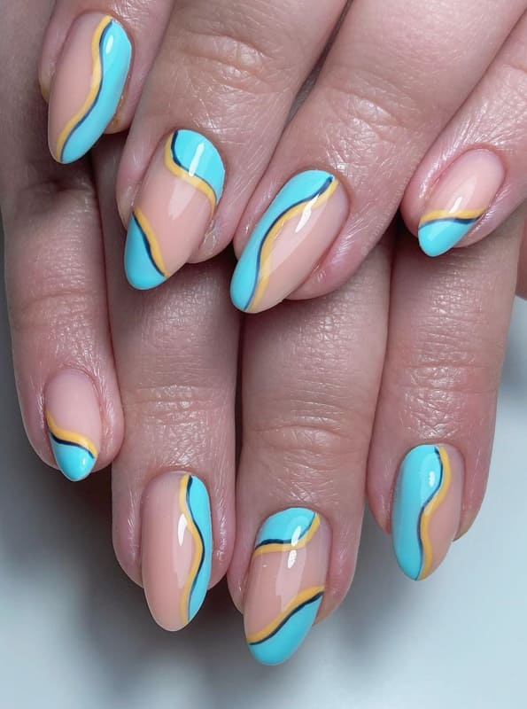 Blue and orange swirl nails